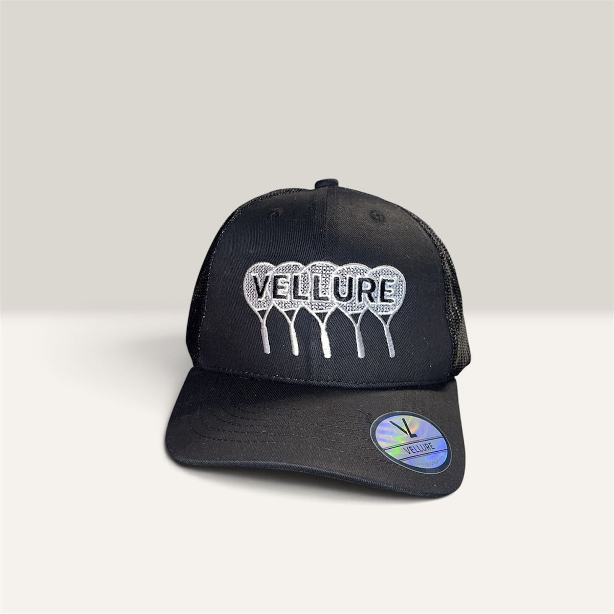 Genuine Black VELLURE Signature Tennis Trucker Cap with white embroidered tennis detailing