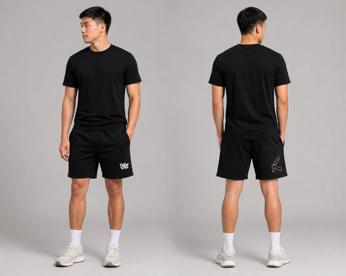 Male model wearing VELLURE black cotton fleece shorts, front and rear views