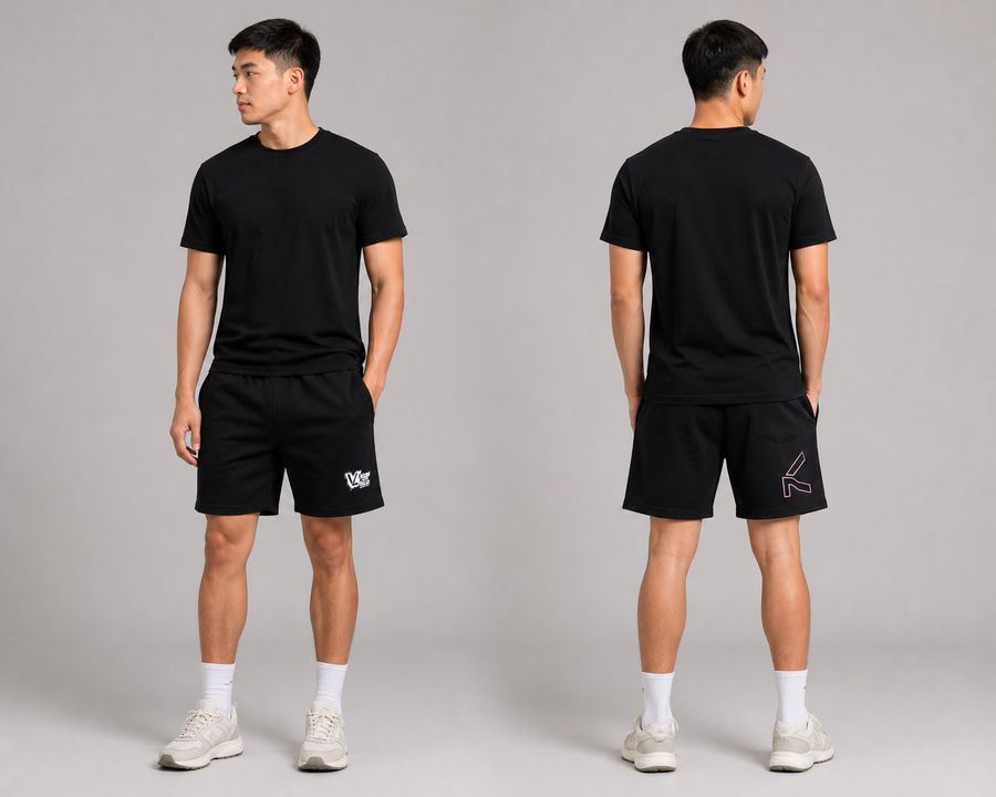 Male model wearing VELLURE black cotton fleece shorts, front and rear views